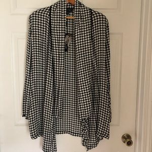 Houndstooth knit cardigan.